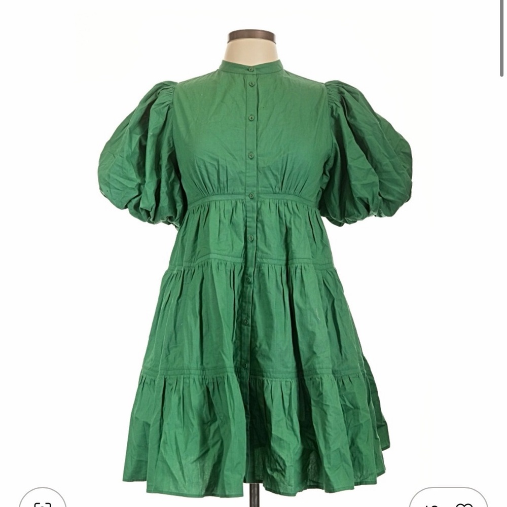 Garrie B poplin tiered puff-sleeve mini shirt dress in green. It features a